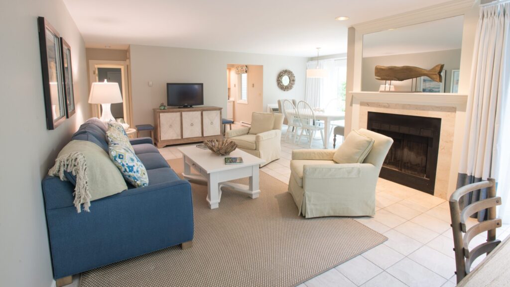 A living room done up in Cape Cod beachy style in one of the villas at Ocean Edge Resort