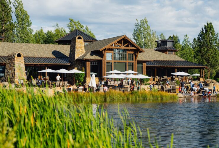 People of all ages enjoying the Lakehouse at Sunriver Resort on a sunny day