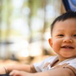 close-up of a cute baby in a stroller