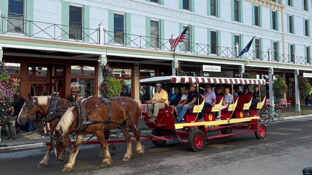 A horse-drawn carriage in the downtown area on Mackinac Island