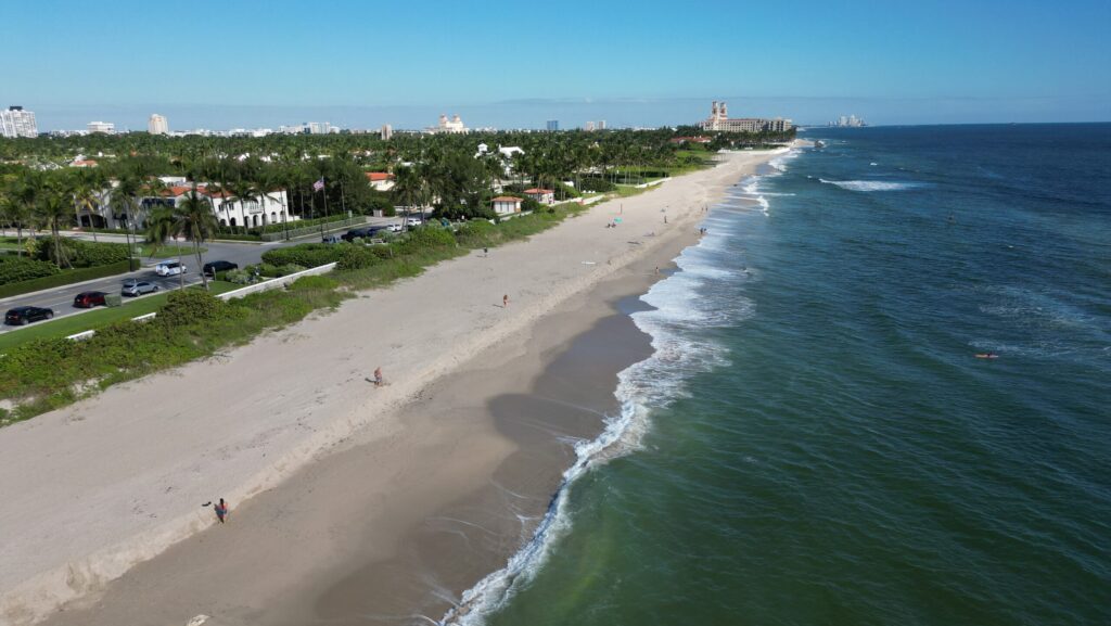 An aerial view of the beach and shoreline in Palm Beach, Florida
