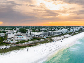 An aerial view of WaterColor Inn and the beach at sunset