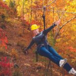 Fall foliage zip lining in Branson, Missouri (Photo: Branson Convention and Visitors Bureau)