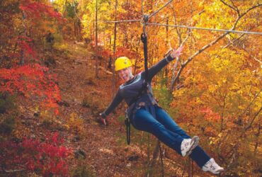 Fall foliage zip lining in Branson, Missouri (Photo: Branson Convention and Visitors Bureau)