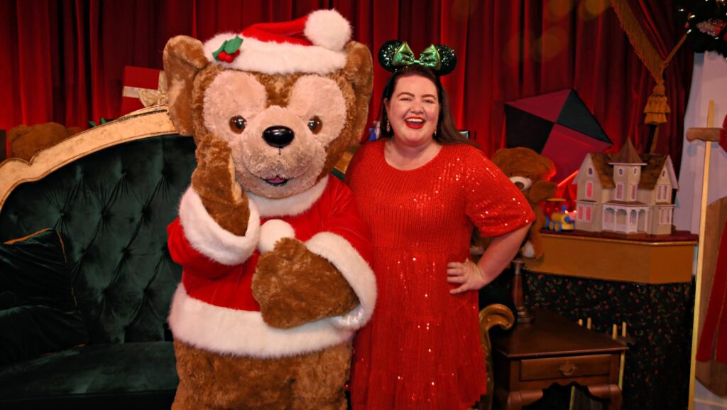 Theme park editor, Megan duBois, with Duffy the Disney Bear at Disney Jollywood Nights