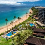 An aerial view of the beach and pools at Royal Lahaina Resort & Bungalows on Maui