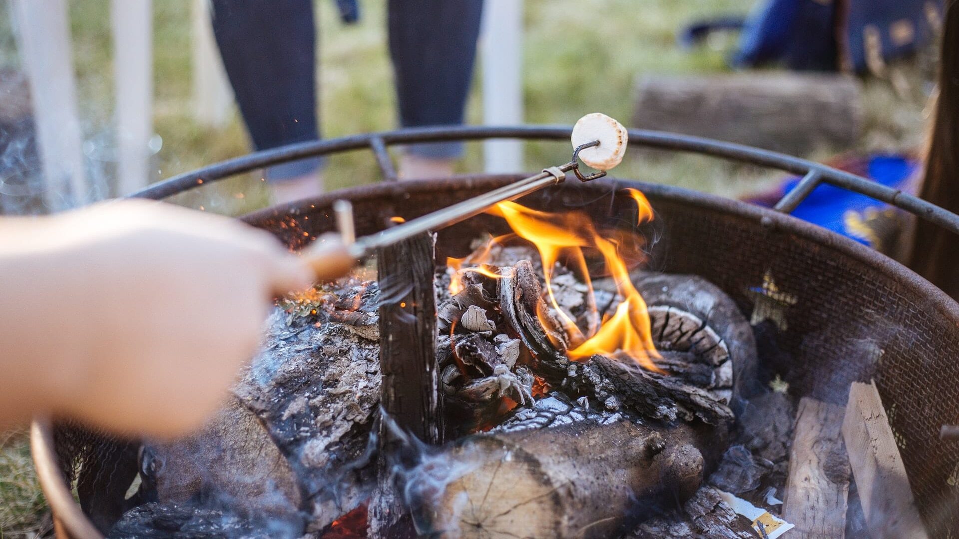 roasting marshmallow over a grill