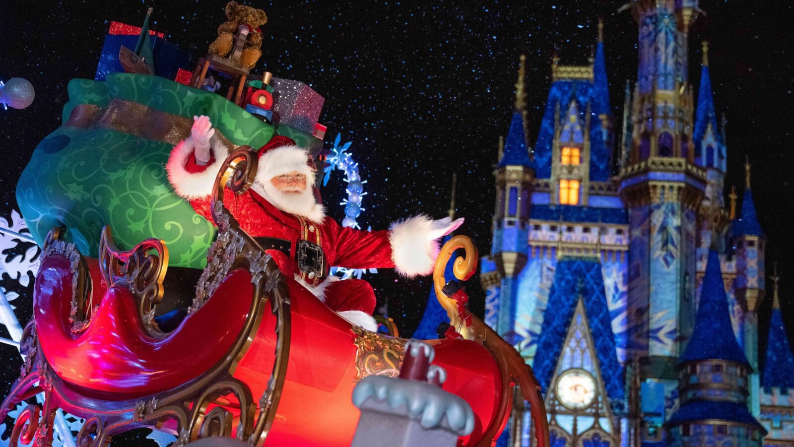 Santa in front of Cinderella Castle at Walt Disney World