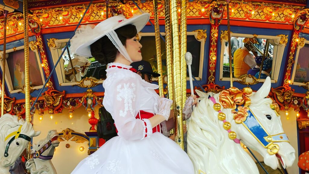 Mary Poppins riding the carousel at Disneyland