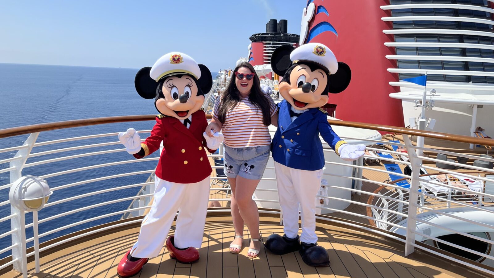 Megan with Captain Mickey and Captain Minnie on Disney Cruise Line