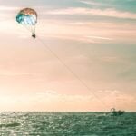 Parasailing at sunset above Clearwater Beach, Florida (Photo: Envato)