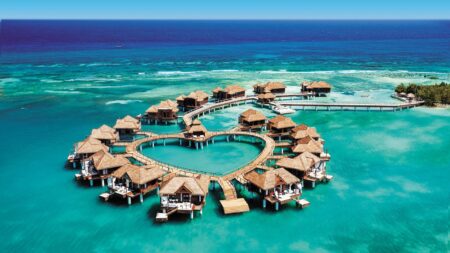 Overwater bungalows in the shape of a heart in