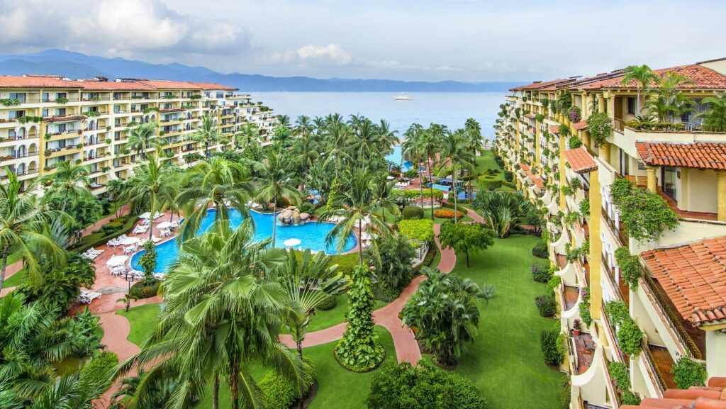 An aerial view of a pool and grounds at Velas Vallarta
