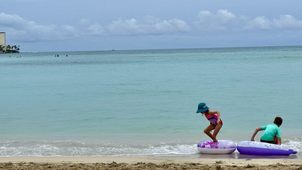 Children playing at Waikiki Beach