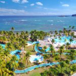 An aerial view of of the water park and beach at Coconut Bay Beach Resort and Spa