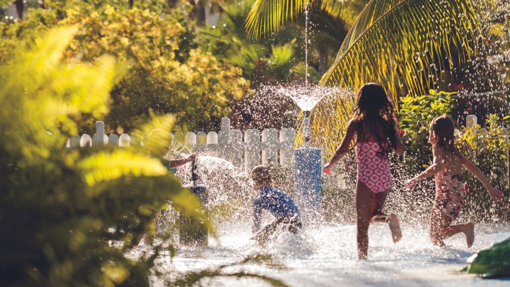 Children Playing in a water fountain at The Ritz-Carlton Grand Cayman (Photo: The Cayman Islands Department of Tourism)
