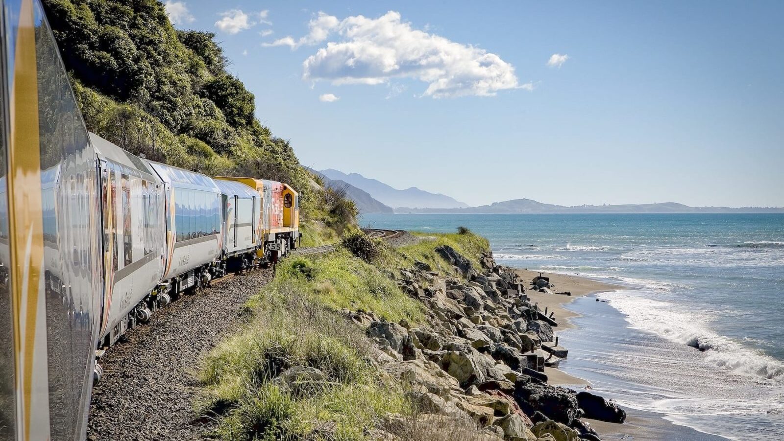 KiwiRail scenic train trip: Mountains and sea near Oaro