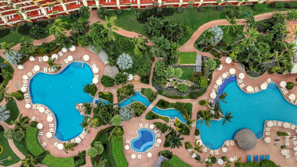 An aerial view of a swimming pool at an all-inclusive resort