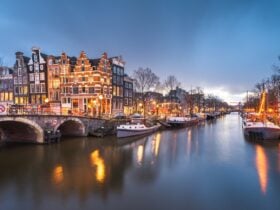 December holiday lights in Amsterdam, with lit up bridges and canals