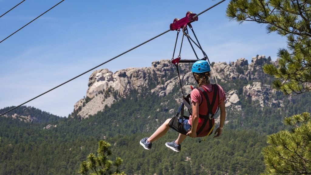 Person on the zipline at Rushmore Tramway Adventures