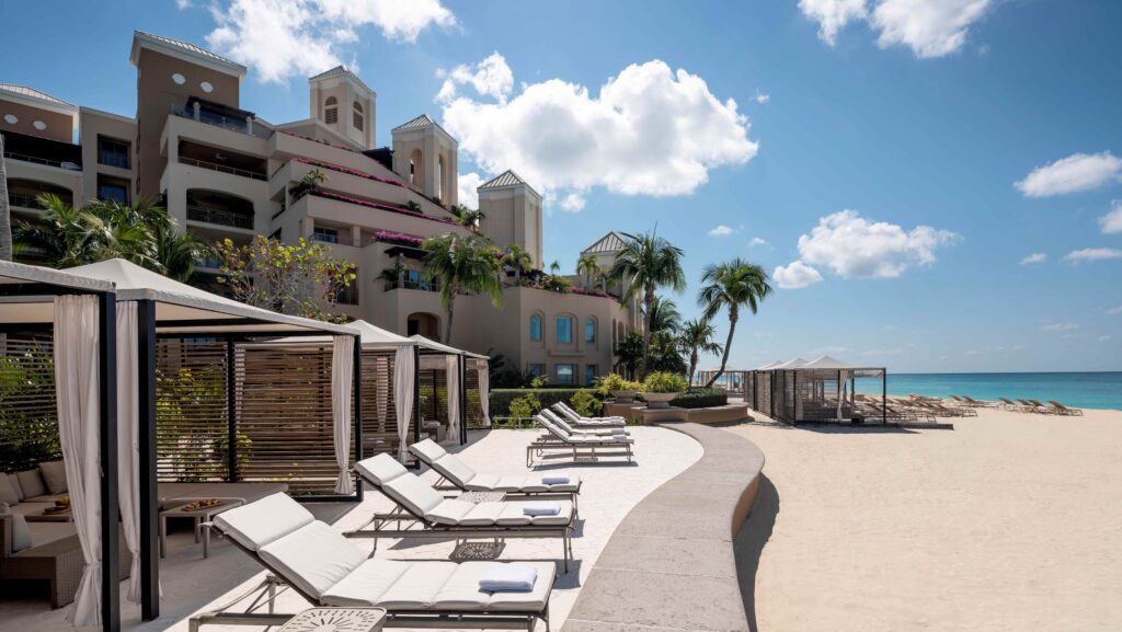 Cabanas and lounge chairs by the beach at The Ritz-Carlton, Grand Cayman