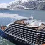 Holland America ship in Alaska with icebergs in background