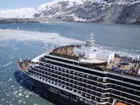 Holland America ship in Alaska with icebergs in background