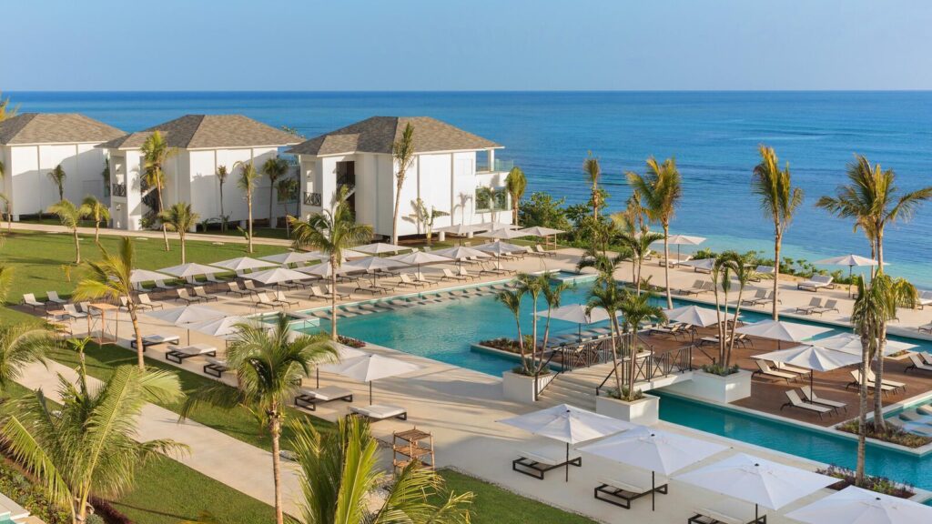 A view of the Beach House and main pool at Excellence Oyster Bay in Jamaica