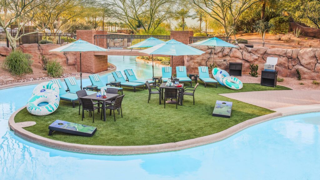 Chairs and umbrellas set up at the Tommy Bahama Relaxation Reef, a private "island" within the lazy river at The Westin Kierland Resort & Spa.