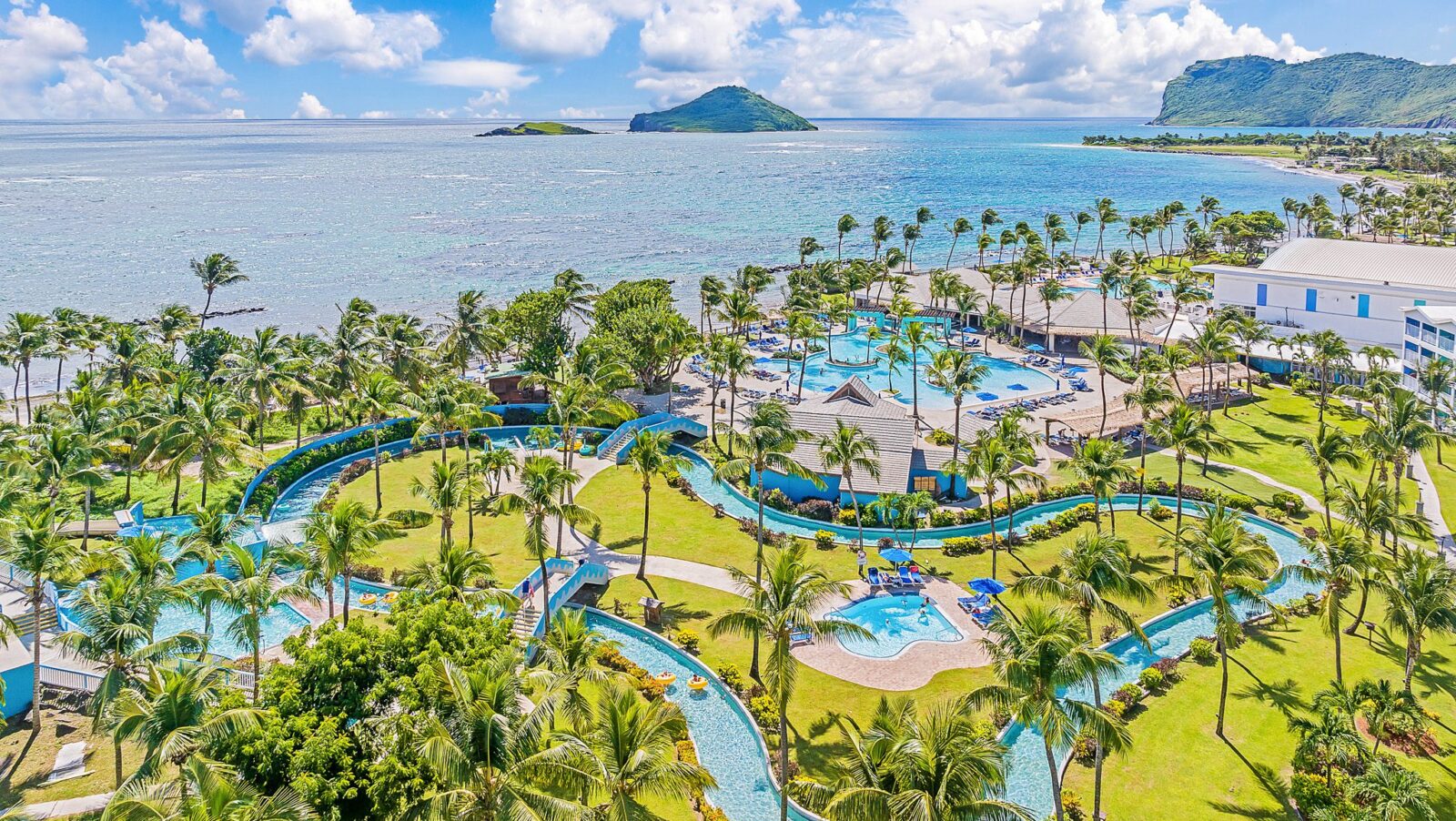 An aerial view of the lazy river and one of the pools at Coconut Bay Beach Resort & Spa
