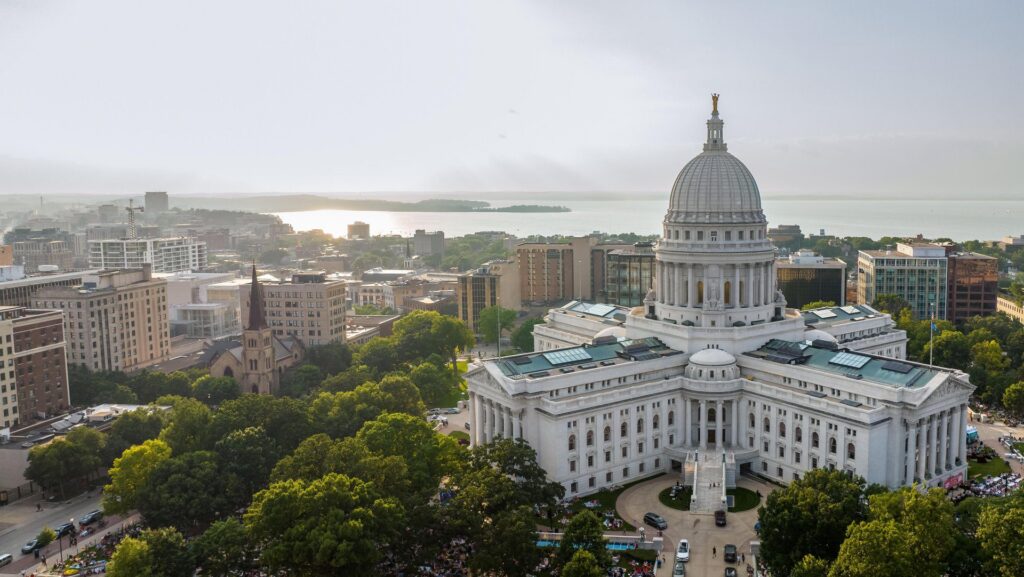 An aerial view of Madison, Wisconsin that includes the state capitol building