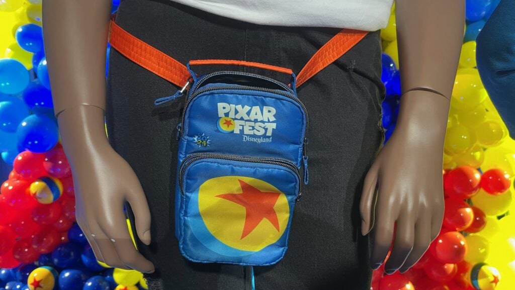 bag and shirt, some of the merch available at Pixar Fest 2024