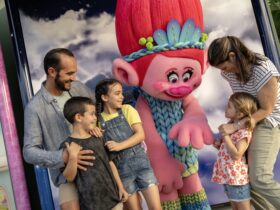 Family meeting the pink troll known as Poppy