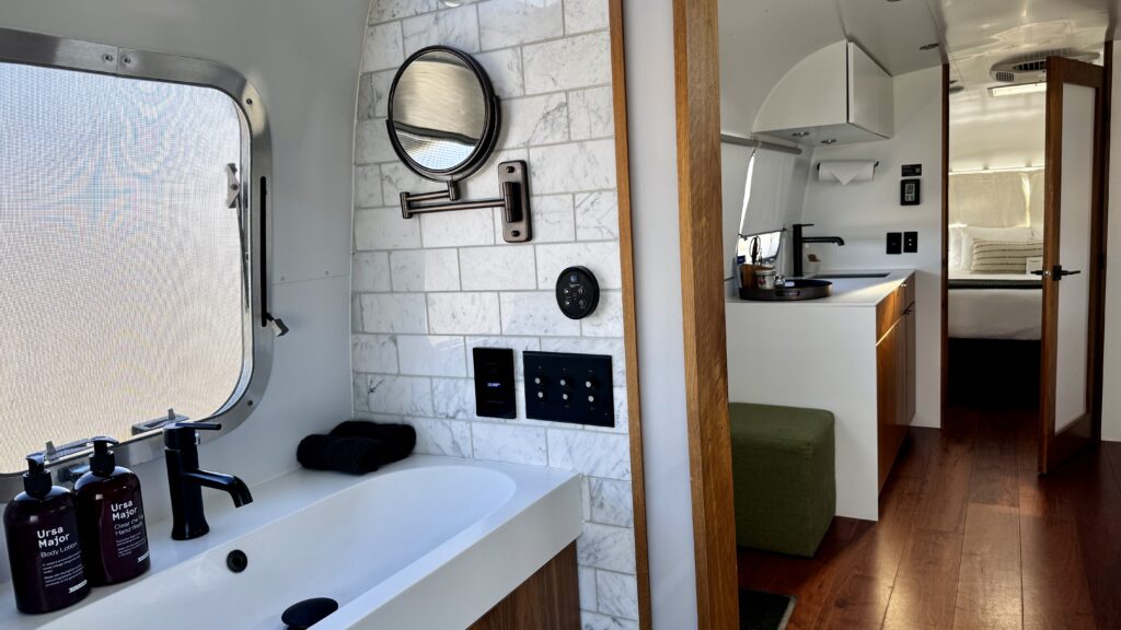 view of interior of glamping AutoCamp Airstream trailer in Joshua Tree, California