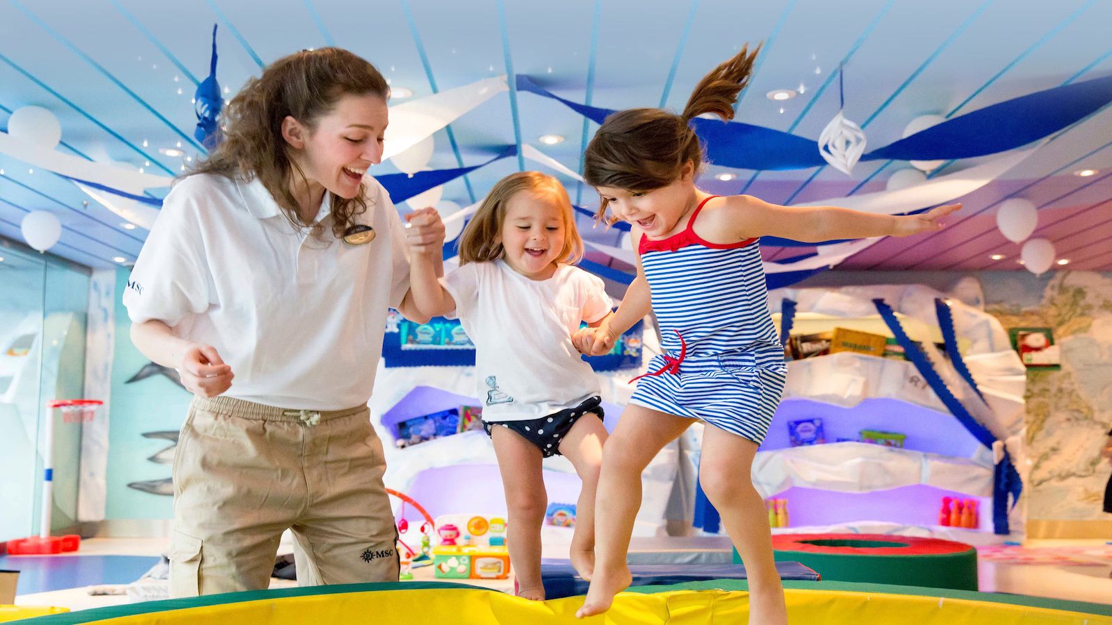 care giver playing with toddlers on an MSC cruise