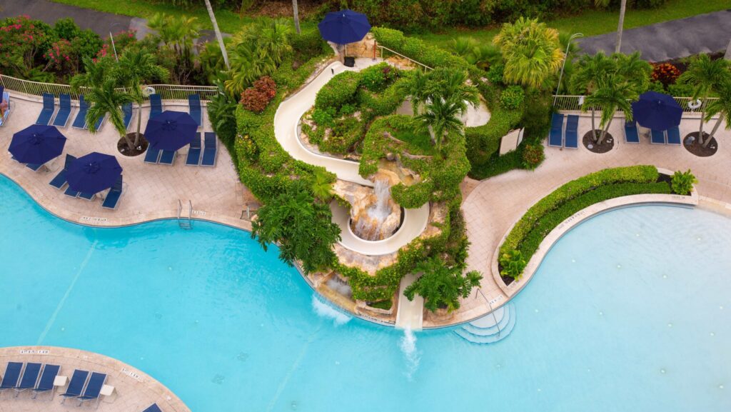 Twisting waterslide into the pool at Naples Grande