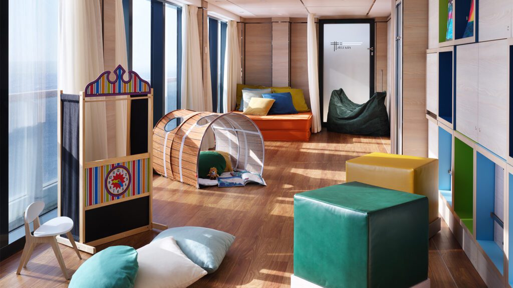 Children's club on cruise ship with lounging cubes, chairs, and toys