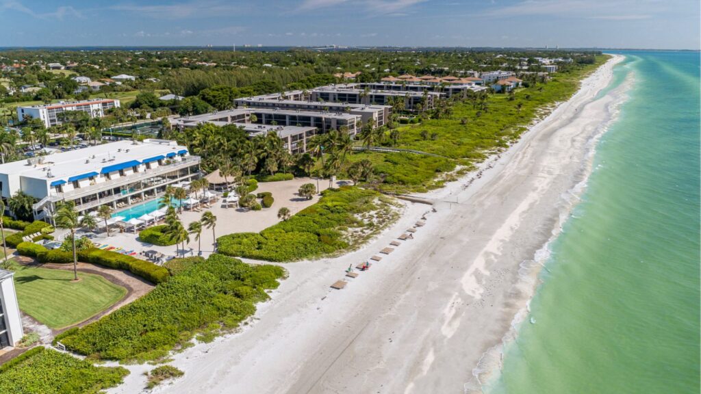 An aerial view of Sundial Beach Resort & Spa and the beach on Sanibel Island, Florida