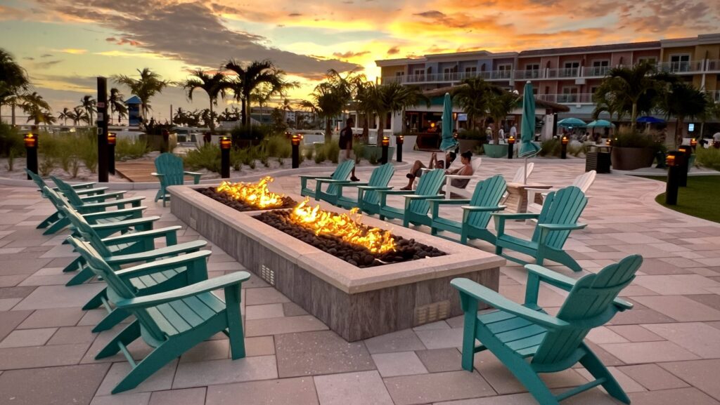 Chairs around a firepit at sunset at Margaritaville Fort Myers Beach