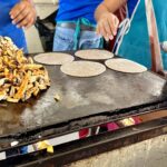 tacos being cooked at a taco stand in Puerto Vallarta on a food tour