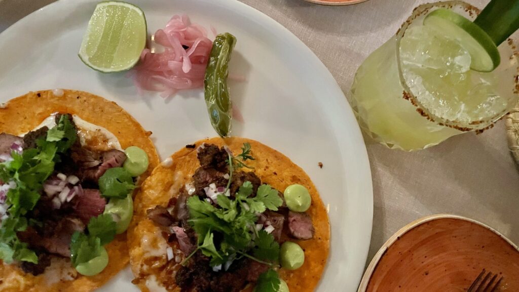 overhead view of tacos and cocktail at Grand Velas Riviera Nayarit