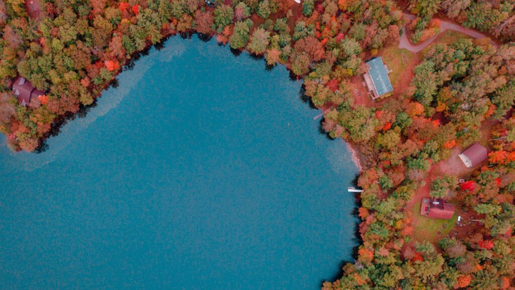 Aerial view of a lake and fall leaves in Bayfield, Wisconsin