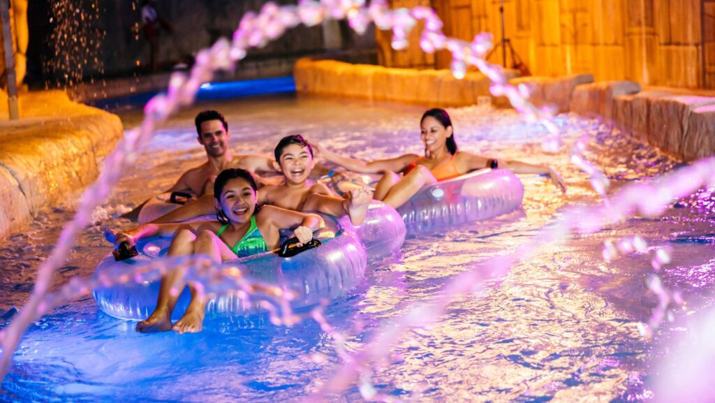 A family on the Lost River at Aquatopia Indoor Waterpark