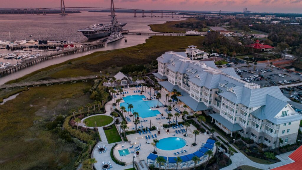 An aerial sunset view of The Beach Club at Charleston Harbor Resort and Marina 