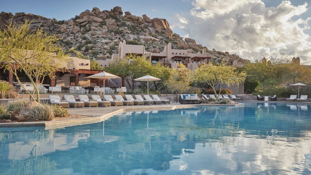 Or one of four pools with Adobe style lodgings in background (Photo: Four Seasons)