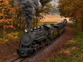 An East Broad Top Railroad train travels through fall foliage