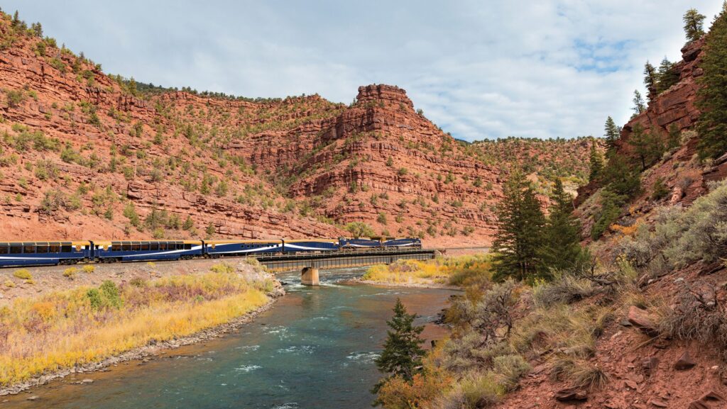 Exterior of Rocky Mountaineer train near Red Canyon along the Rockies to the Red Rocks route