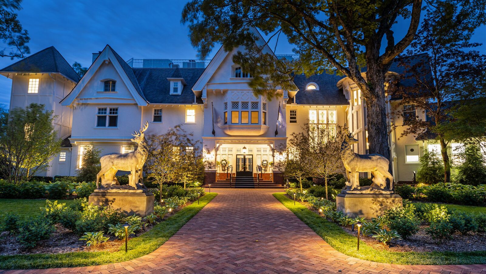 A nighttime view of The Mansion at The Inn at Stonecliffe