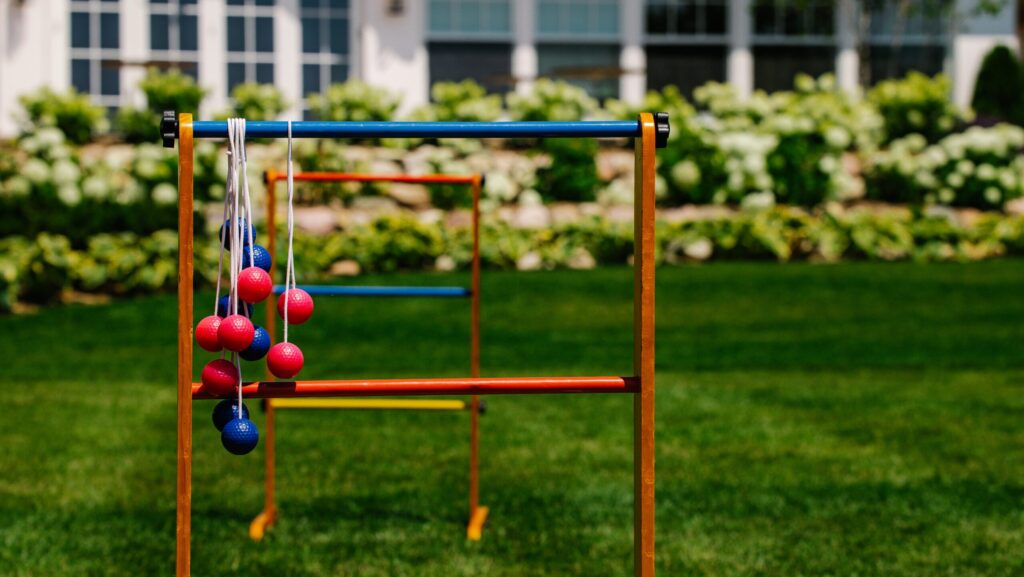 A ladder toss game on the lawn at The Inn at Stonecliffe