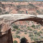 Wesley and Crosby stand atop an arch in Rattlesnake Canyon in Grand Junction, Colorado (Photo: Cynthia J. Drake)